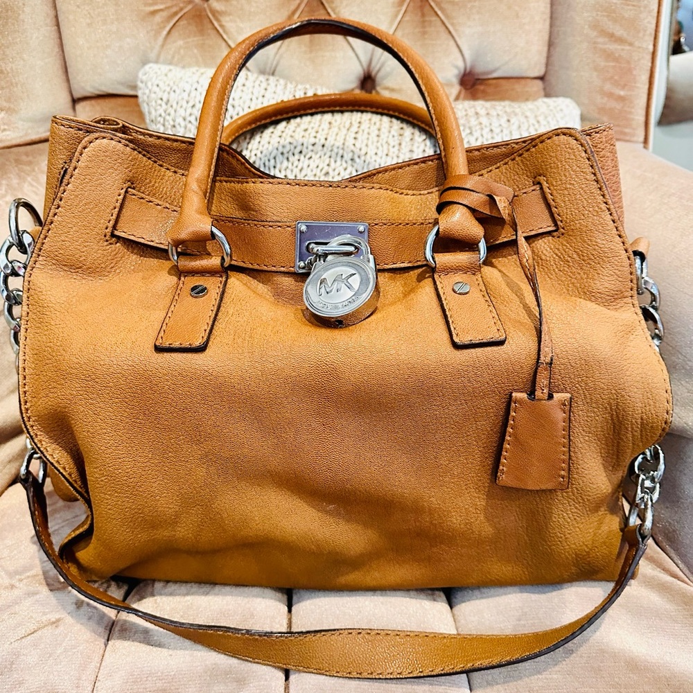Michael Kors signature leather bag with lock. Camel